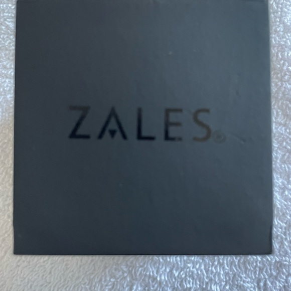 Oval Emerald 1/15 Ct. T.W. Diamond Frame Pendant in 10K Gold. 6mm Emerald stud. - Picture 4 of 4